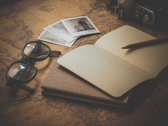 A traveler preparing a traveler list.