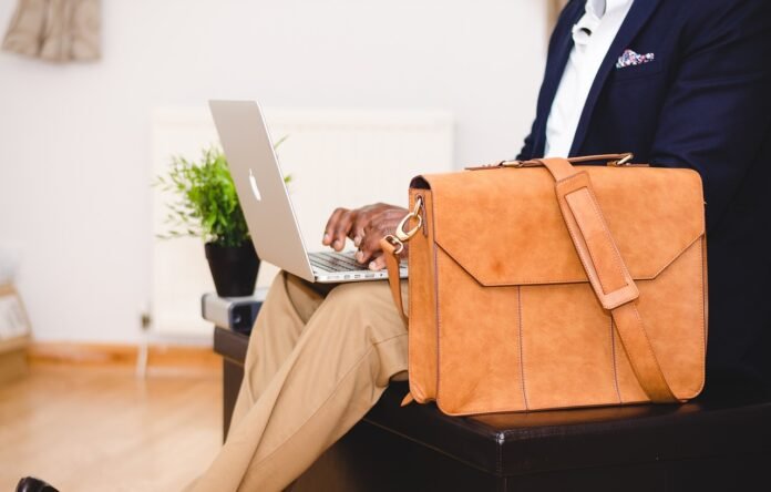 a businessman with a laptop bag