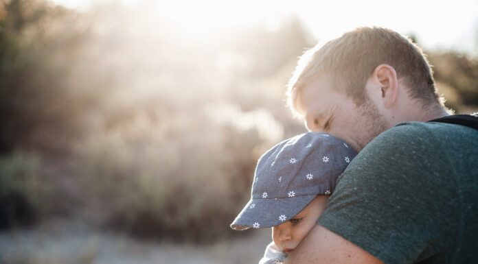 Best Backpack For Parents With Toddlers a dad traveling with young toddler daughter