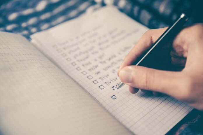 someone going through a travel checklist