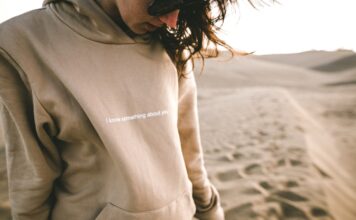 Best Safari Hoodie a woman wearing a hoddie on safari