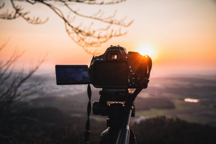professional taking landscape photography
