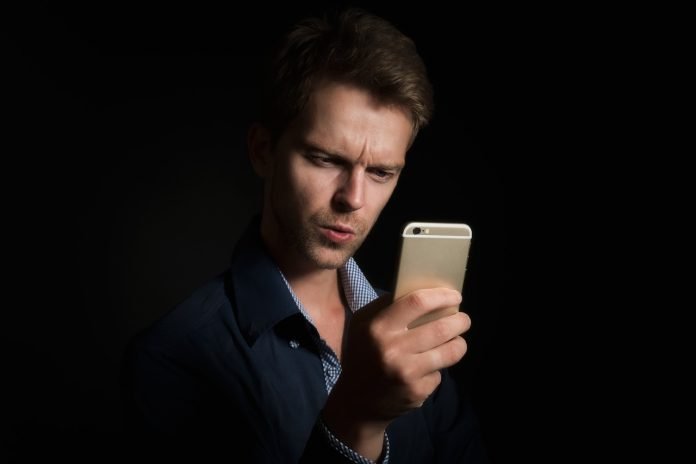 a man looking for internet connection